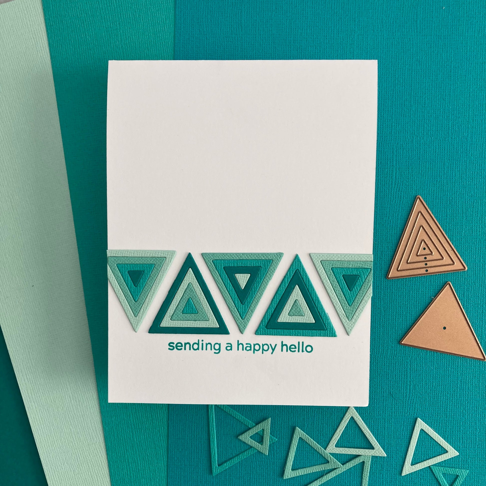 handmade die cut card featuring encore cardstock in teal