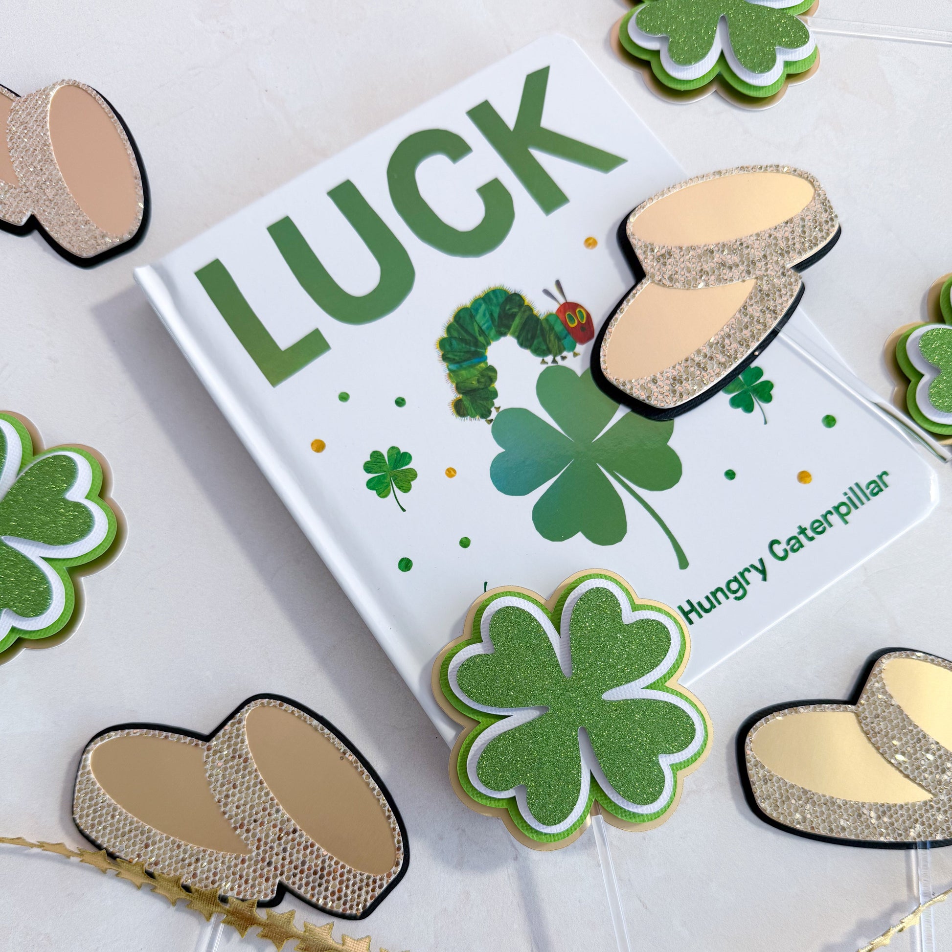 gold matte foil coins with green shamrocks