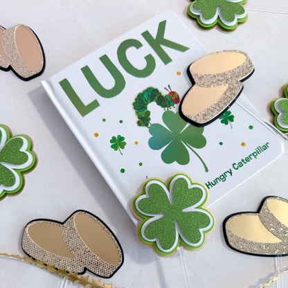 gold matte foil coins with green shamrocks