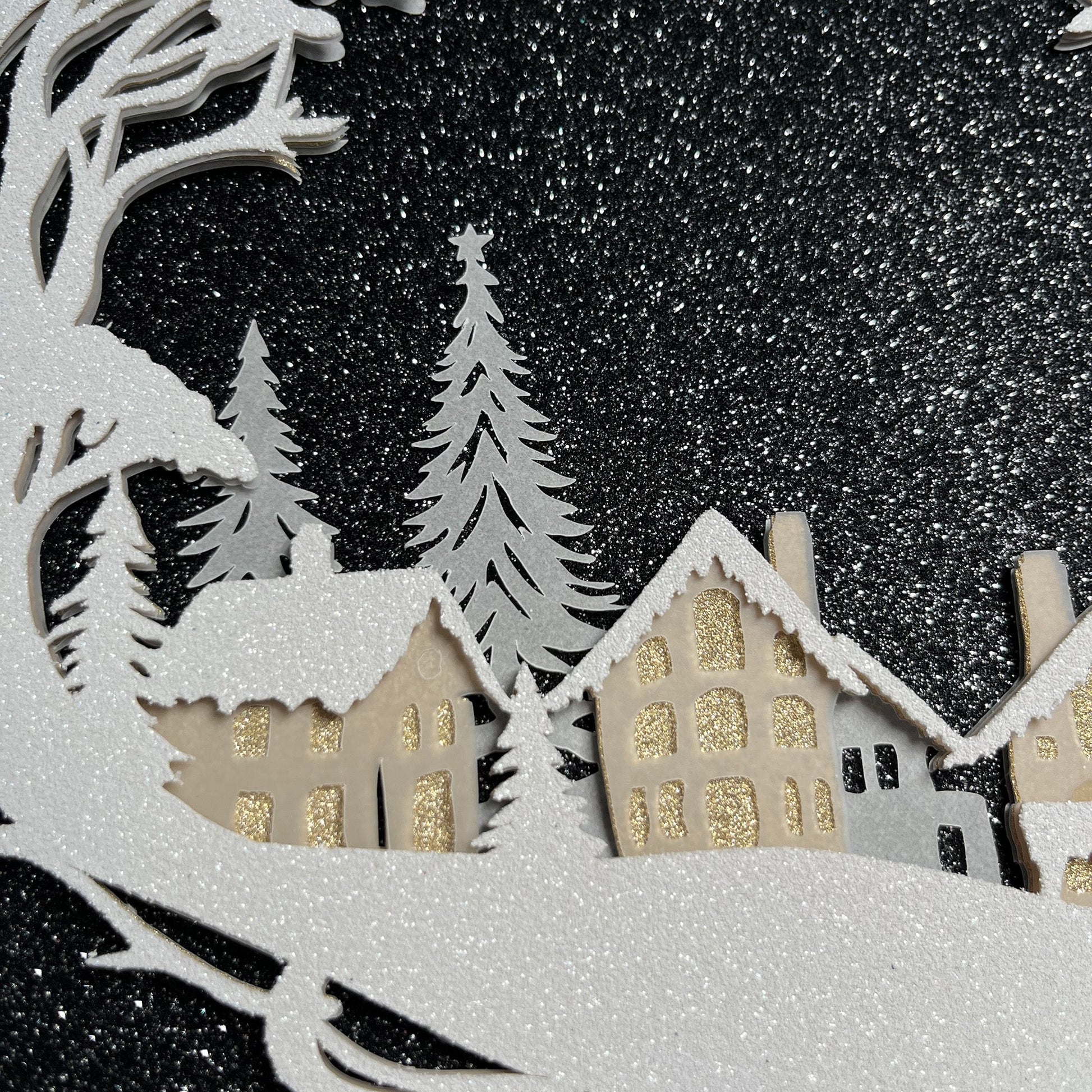 layered paper scene featuring silver and black cardstock